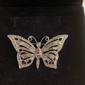 Elegant Silver Butterfly Brooch with Pink Gem
